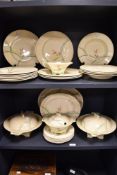 A selection of Art Deco Royal Doulton 'Dubarry' plates, tureens and platters, AF.