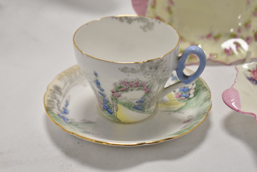 Three pieces of early 20th century Shelley wares including a tea cup and saucer set no. 823343 and - Image 2 of 7