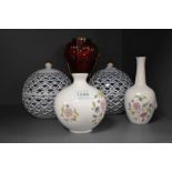 Two small Minton 'Haddon Hall'vases, a pair of Walter Germany reticulated blue and white vases and