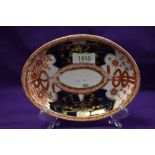 An antique meat dish marked Anstice Horton and Rose. Decorated in an Imari design.