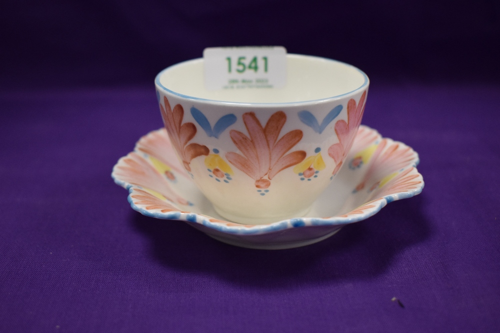 An Art Deco tea bowl and saucer from a Shelley pattern.