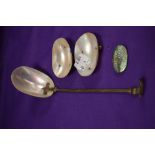 An early 20th century table salt serving set in mother of pearl with a silver and carved shell