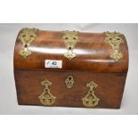 A Victorian dome topped office desk top tidy and stationary and letter rack, having a walnut case