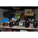 A collection of vintage cameras, flashes and accessories, makes such as Agfa, Nova and Halina