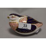 A Royal Crown Derby quail paperweight, having silver stopper.