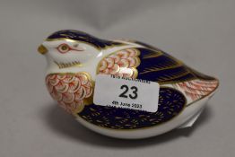 A Royal Crown Derby quail paperweight, having silver stopper.