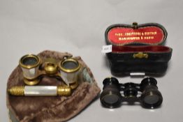 Two pairs of early 20th century opera glasses, including mother of pearl and brass set.