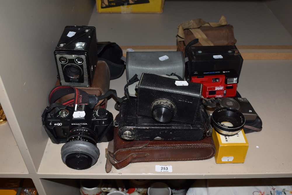 A variety of vintage cameras and a lens, Praktica sport, Praktica BX20, Kodak Cresta 3, Kodak