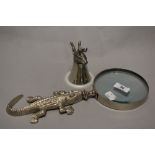 An English pewter cup, having hare head with antlers, sold with a magnifying glass with alligator