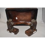 A carved wood tray or bowl and a pair of 1930s carved dog book ends.