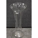 A modern large floor standing hand blown glass vase of fluted bell form 60cm tall.