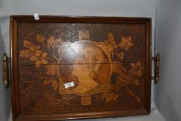 An Arts and Crafts butlers tray with a poker worked image of an Art Nouveau lady. 57cm wide.