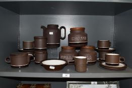 A selection of retro Hornsea pottery 'Contrast' kitchen including storage jars, teapot, cups and