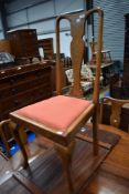 A set of four early 20th Century oak dining chairs having Queen Anne style legs