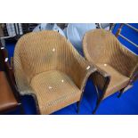 A pair of Lloyd Loom tub chairs