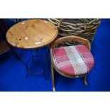 An Art Deco style dressing table stool with later upholstered seat and a modern pine occasional