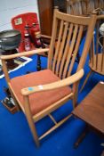 A modern Ercol carver chair