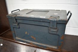 A vintage military ammo box, in airforce grey, date 1956