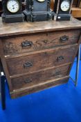 A late Victorian oak chest of three drawers