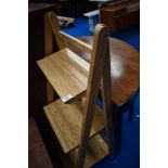 A modern beech effect folding pan rack or similar