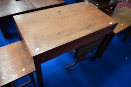 A vintage teak fold over card table, similar to those seen in military offices in past