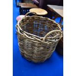 An oversized log or laundry type basket