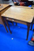 A vintage oak school desk