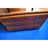 A vintage pine bedroom chest of three long drawers