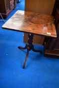 A Victorian mahogany occasional pedestal table having square top, turned column and triple splay