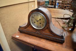 An early 20th Century oak cased Napoleon mantel clock