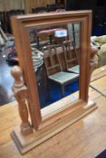A modern pine toilet mirror, height approx. 40cm