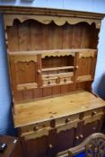 A vintage pine kitchen dresser