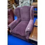 A modern wing back armchair