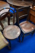 A traditional bentwood chair and a Victorian bedroom chair with ply seat