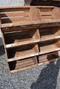 A set of four rustic wooden double nesting boxes/container bins