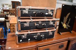 A set of three travel cases