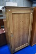 A Victorian stripped pine full height cupboard/wardobe