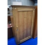 A Victorian stripped pine full height cupboard/wardobe