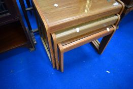 A mid to late 20th Century nest of three tables