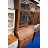 An early 20th Century Regency revival mahogany bureau bookcase