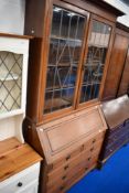 An early 20th Century Regency revival mahogany bureau bookcase