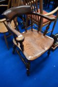 A 19th Century captains elbow chair