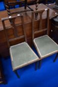 Two early 20th Century oak framed bedroom chairs
