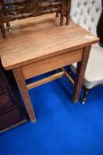 A vintage stripped work table