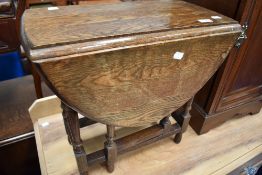 An early 20th Century oak occasional gateleg table of small proportions