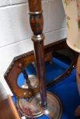 An early 20th Century oak wall mirror and a standard lamp (af)