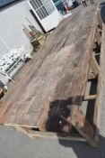 An antique wood workers three bay Bench with plank top. 12ft by 4ft