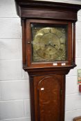 An 18th Century oak long cased clock having 8 day movement with brass dial , marked I,LL