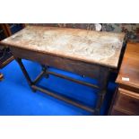 A Victorian oak side table having drawer to end