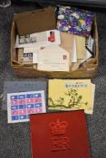 A collection of mixed stamps including sheets of unused stamps, first day covers and ephemera such
